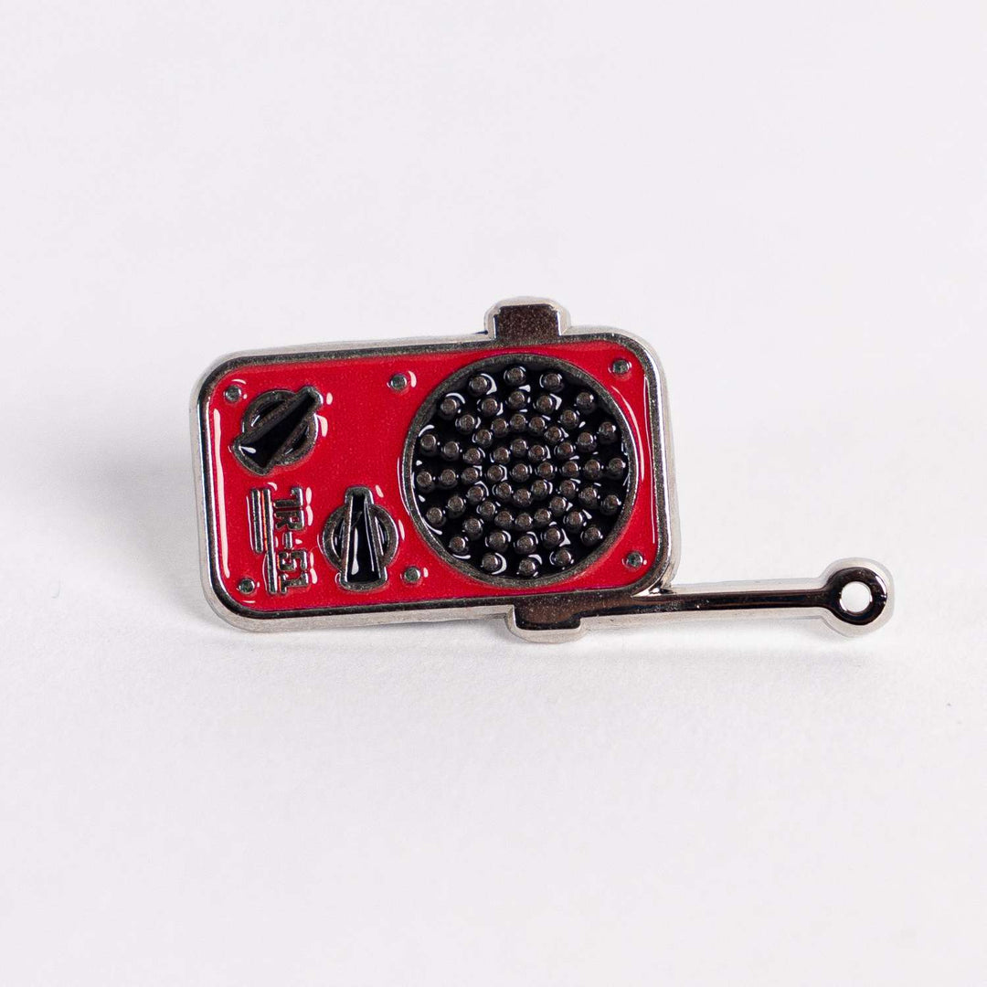 The Invincible Tracker Pin – Tilt